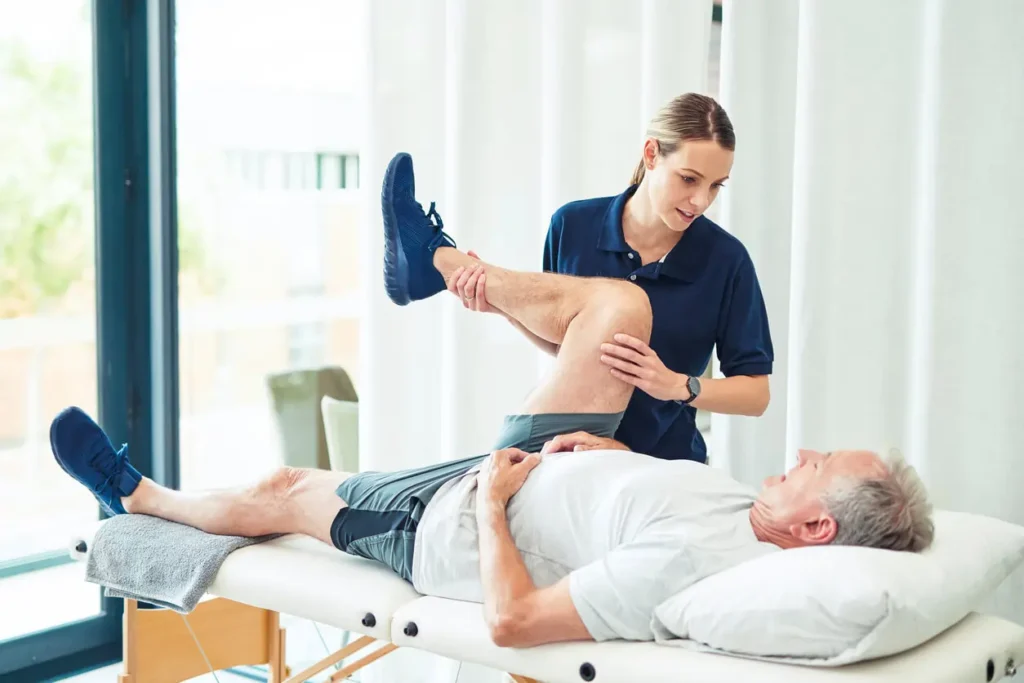 Revitalising Recovery: Effective Rehabilitation Strategies for Muscle Injuries 3 Physiotherapist assisting a patient with muscle recovery exercises Billericay