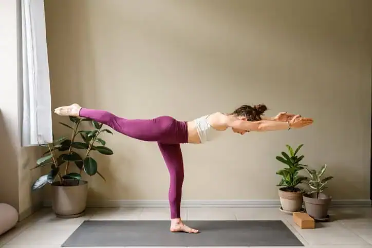 Achieving the Perfect Tone: How Often Should You Exercise for Results? 1 Woman doing Yoga exercise Billericay to help with toning the body.