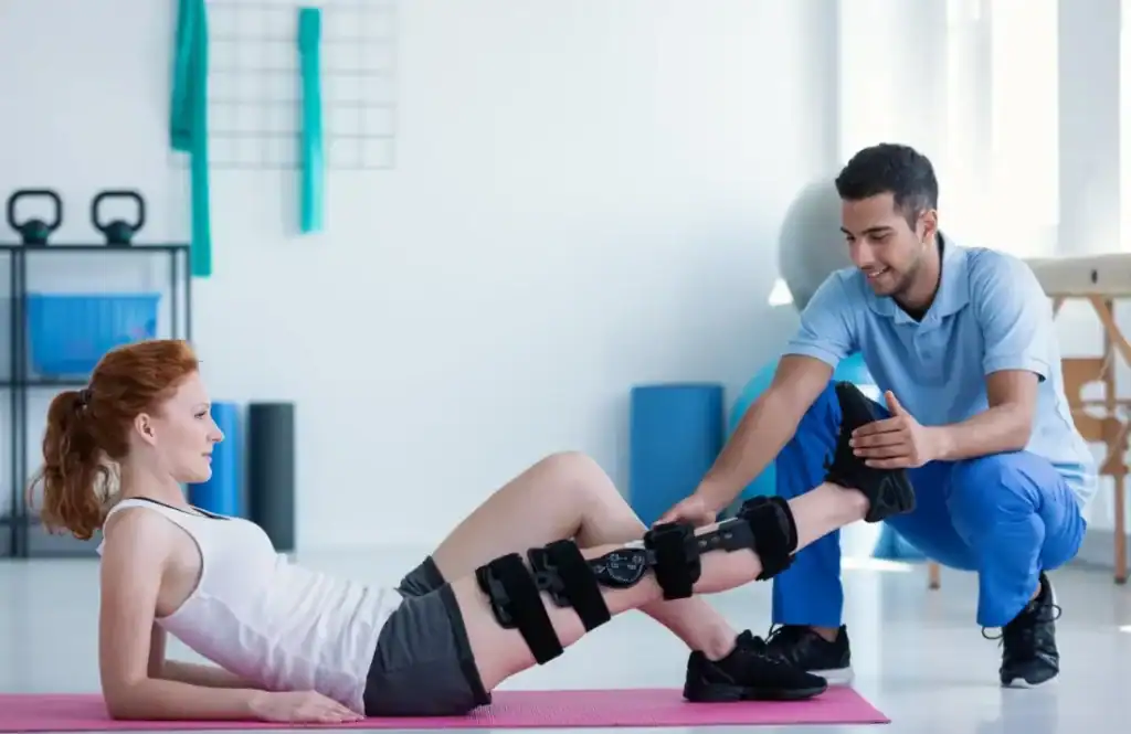 Woman having treatment to help muscle recovery Billericay after an injury